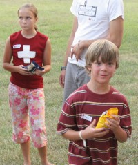 Katia and Theo with prize candy