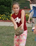 Katia throwing the rock