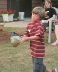 Theo throwing the rock