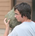 Boy throwing the rock