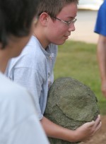 Boy throwing the rock