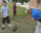 Calvin throwing the rock